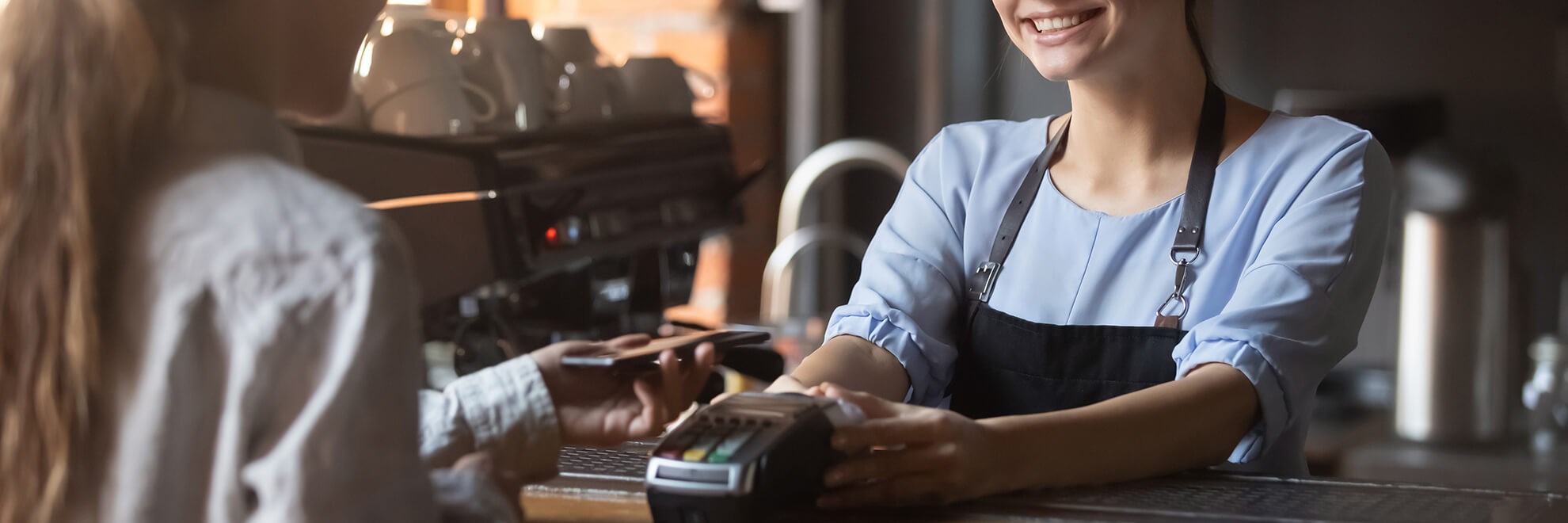 woman using debit card