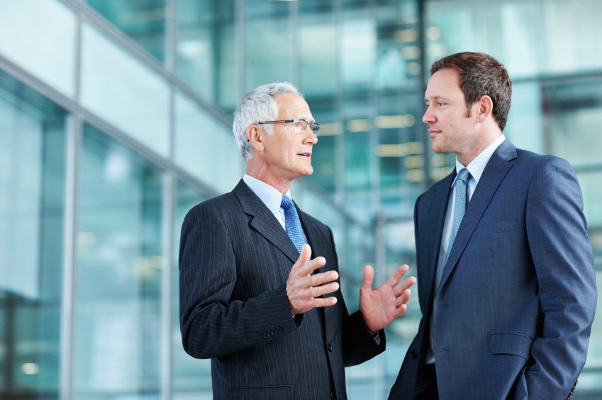 Two businessmen in conversation